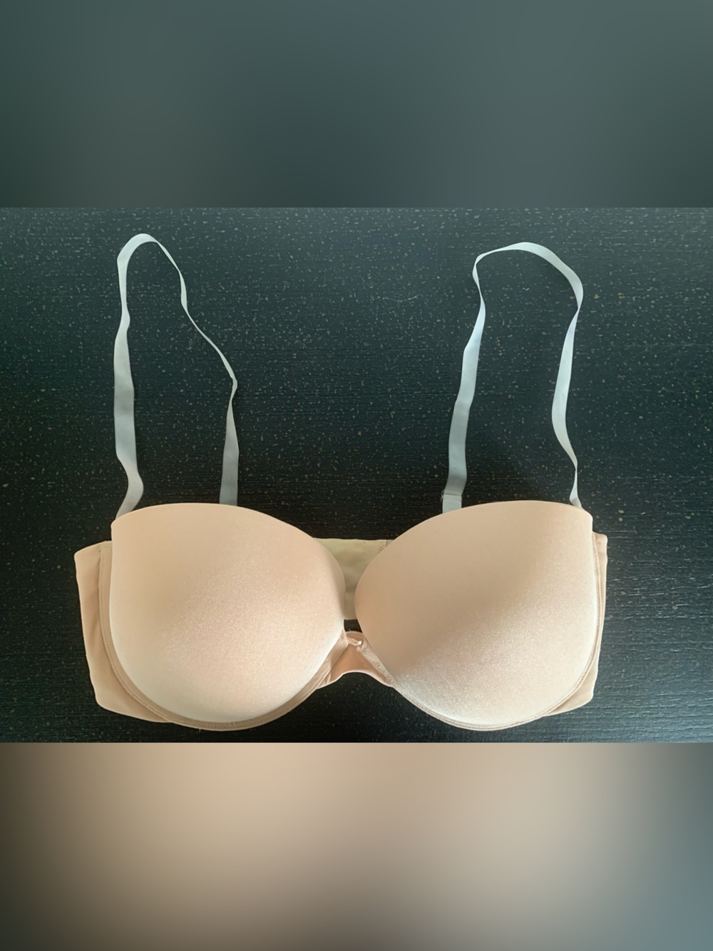 Beige strapless bra with clear adjustable straps 
Like New